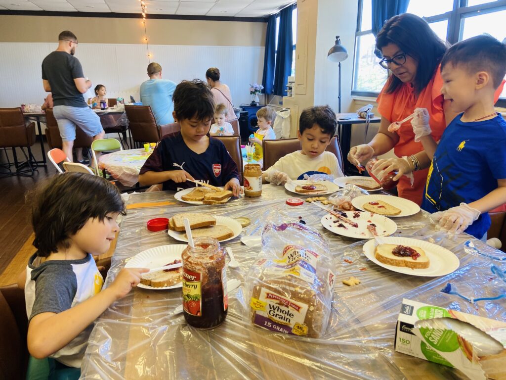 Families coming together for a KidsGiving community event