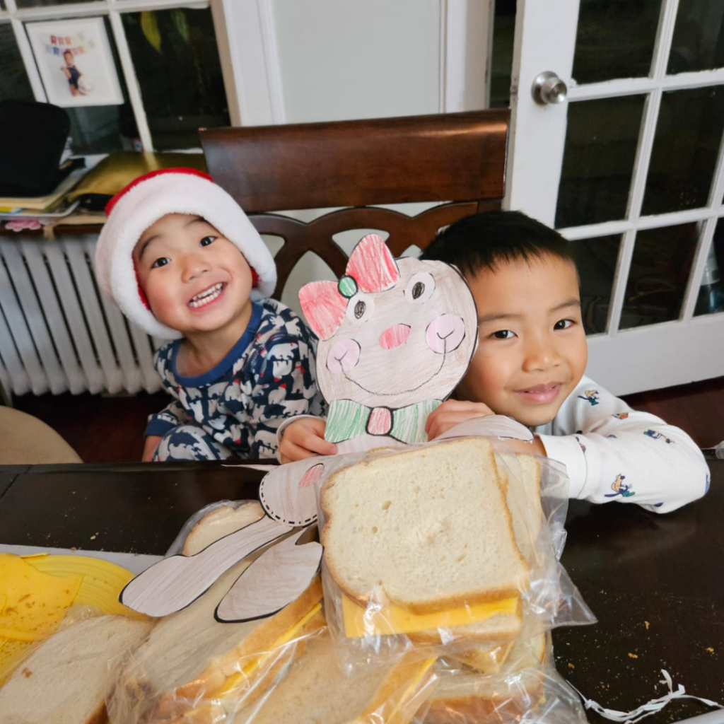 Families making sandwiches for the holiday sandwich drive